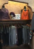 clothing rack and painted walls