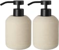 two soap dispensers with soap dispensers