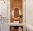 Villa Nila bathroom featuring natural textures and a seamless connection to the outdoor patio blend