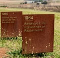 two plaques of plaques of the same name and date