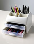  a desk organizer and pens, representing a thoughtful affordable gift idea under $30 