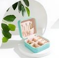 a jewelry box with a bunch of jewelry inside