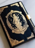a journal, representing a thoughtful affordable gift idea under $30 for creat