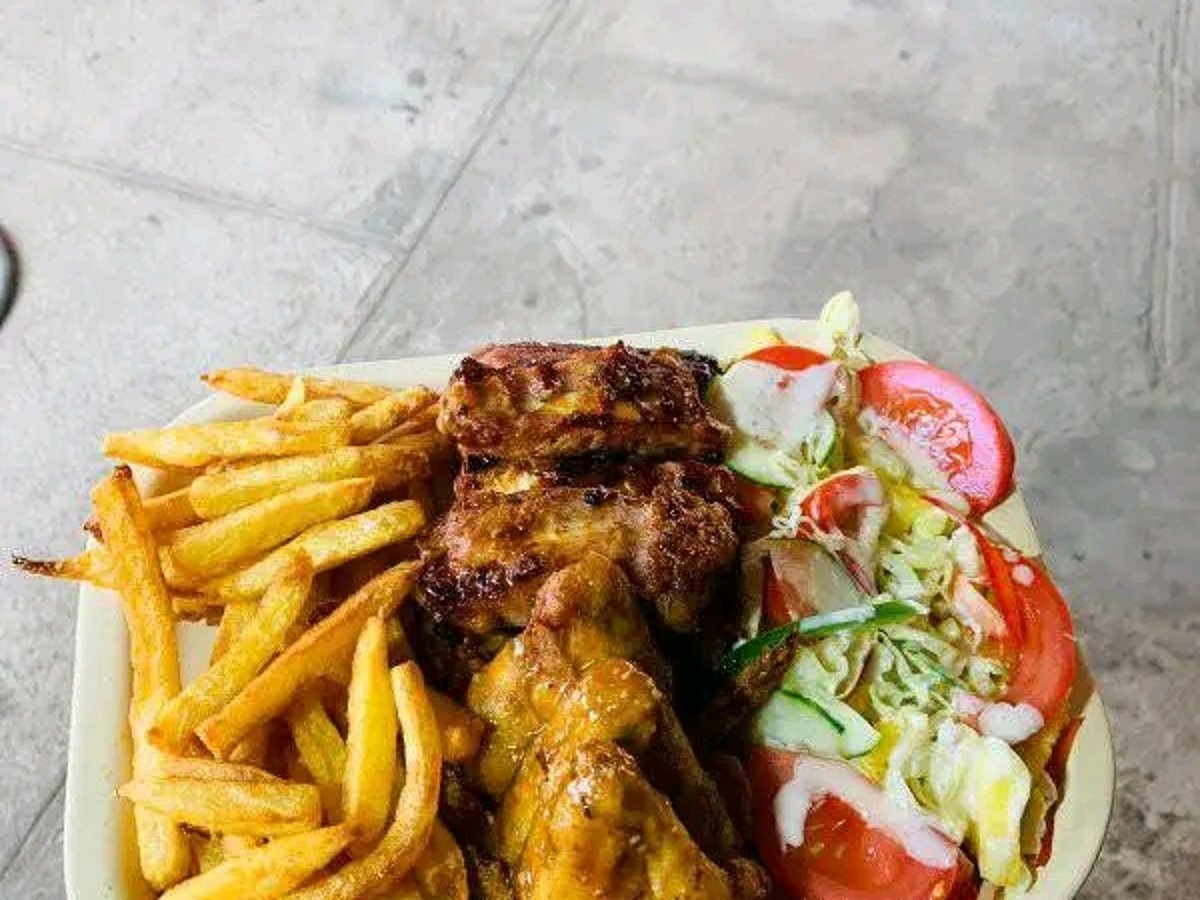 Braai-style grilled meats served from the open flame