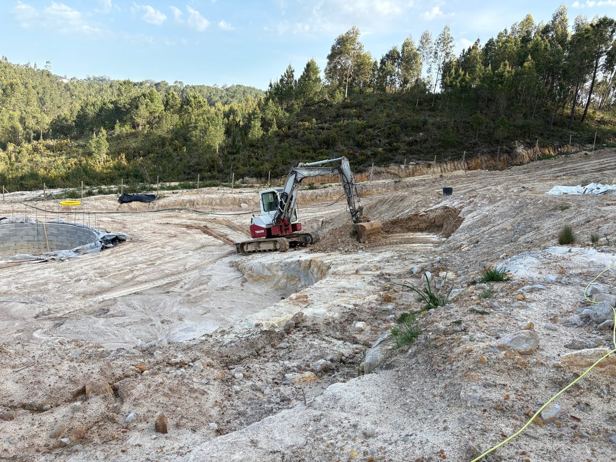Hand-set limestone stonework in progress — Lisbon Natural Pool Oasis, Portugal