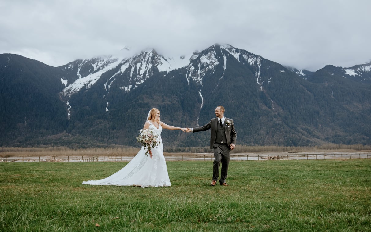 agassiz wedding photography fraser river lodge Holding Hands with mountains