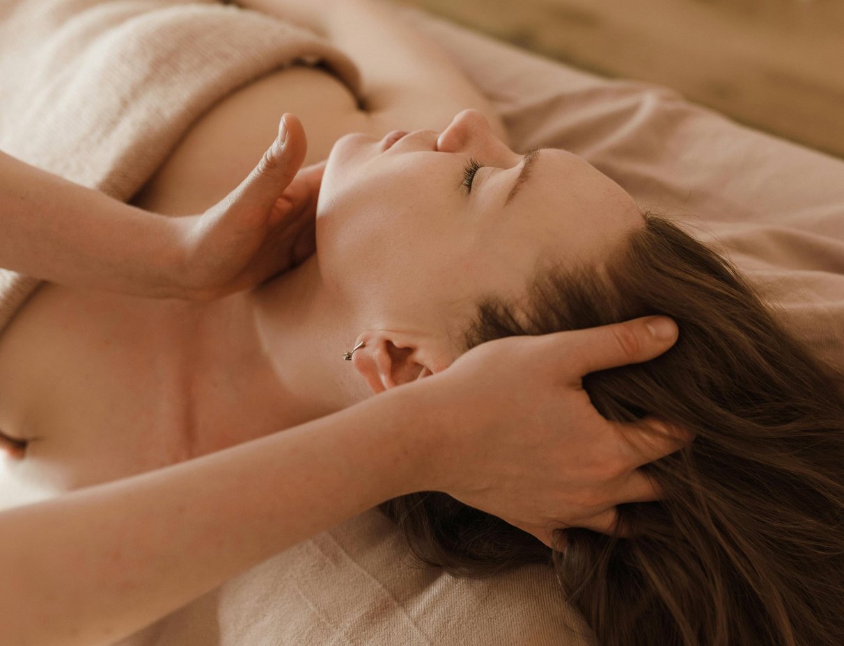 women with a facial massage