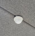 Built-in ceiling-mounted motion sensor on acoustic panel