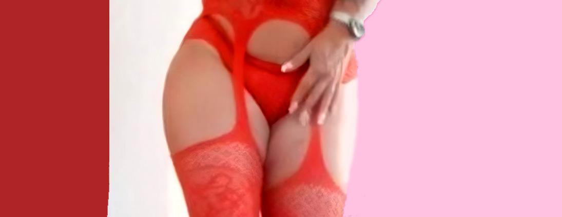 a woman in a red lingersuit with stockings and stockings