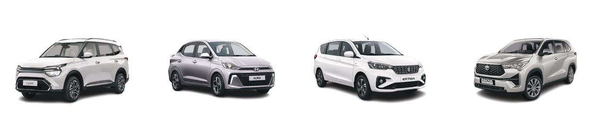 a group of four different cars parked in a row