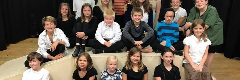 a group of children actors posing for a group photo
