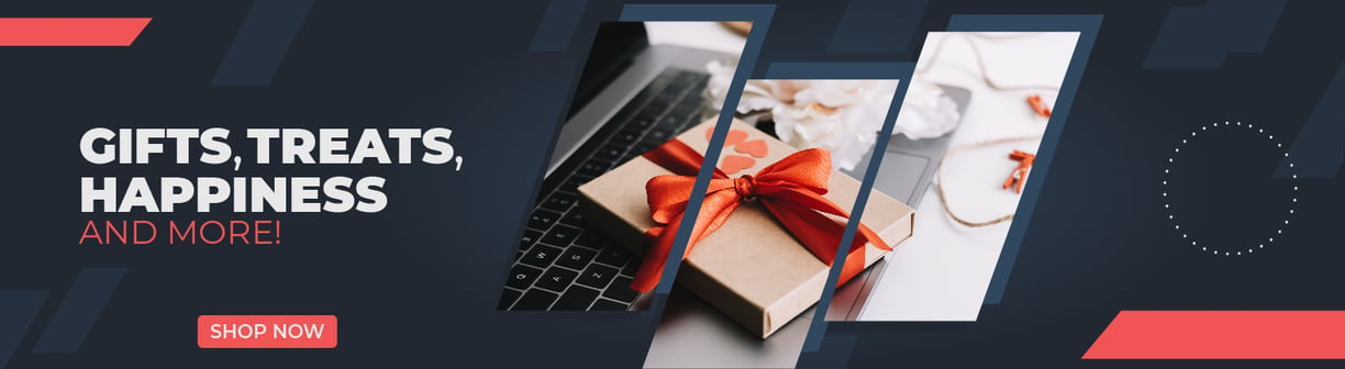 a laptop computer with a gift wrapped in red ribbon