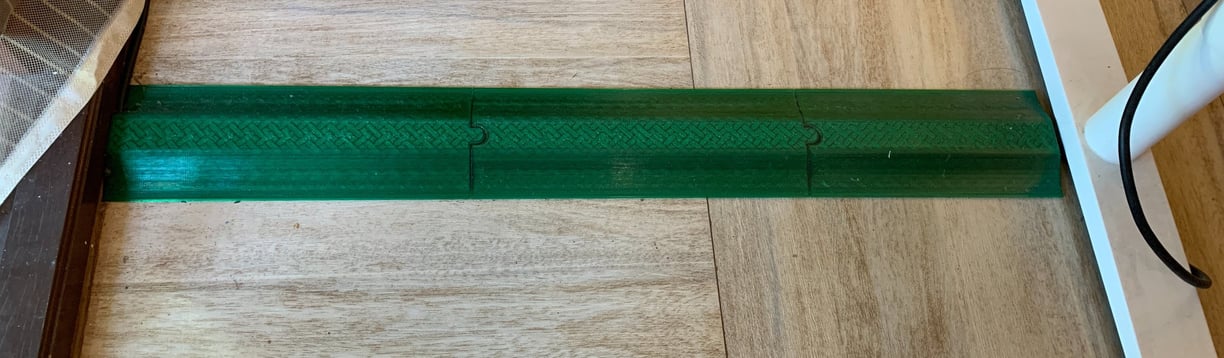 3D printed cable cover with smooth profile, for Roomba-like vacuum cleaners 
