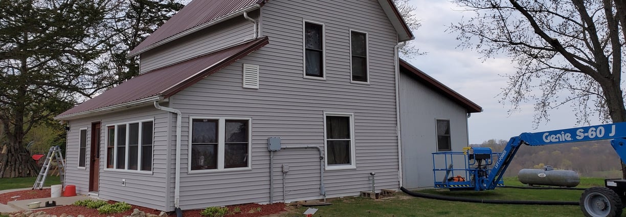 a house with new siding and new windows