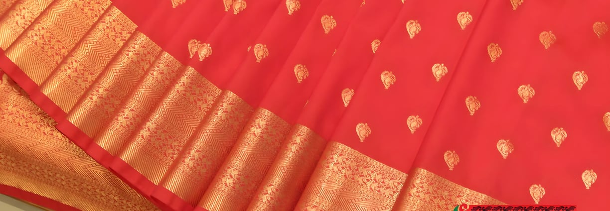 Elegant red silk saree with intricate gold zari work from the best saree shop in Jayanagar