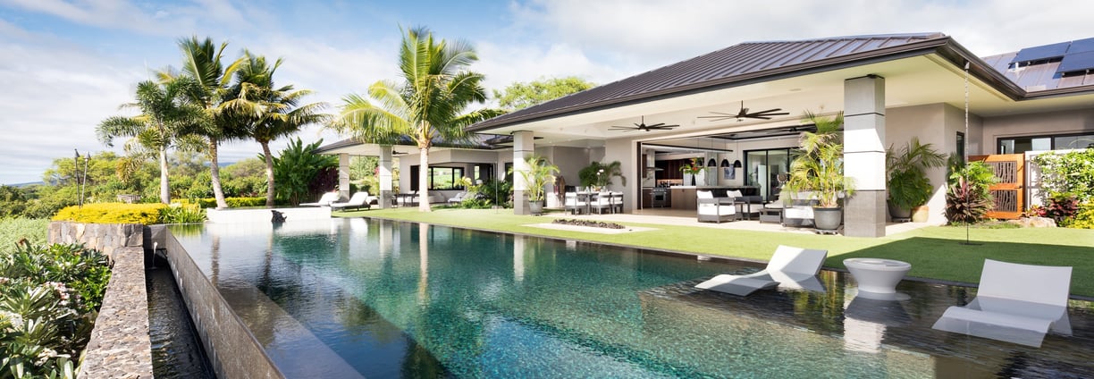 a pool with a view of a house