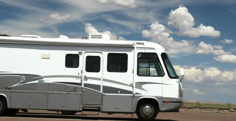 a motorhome rv parked in a parking lot
