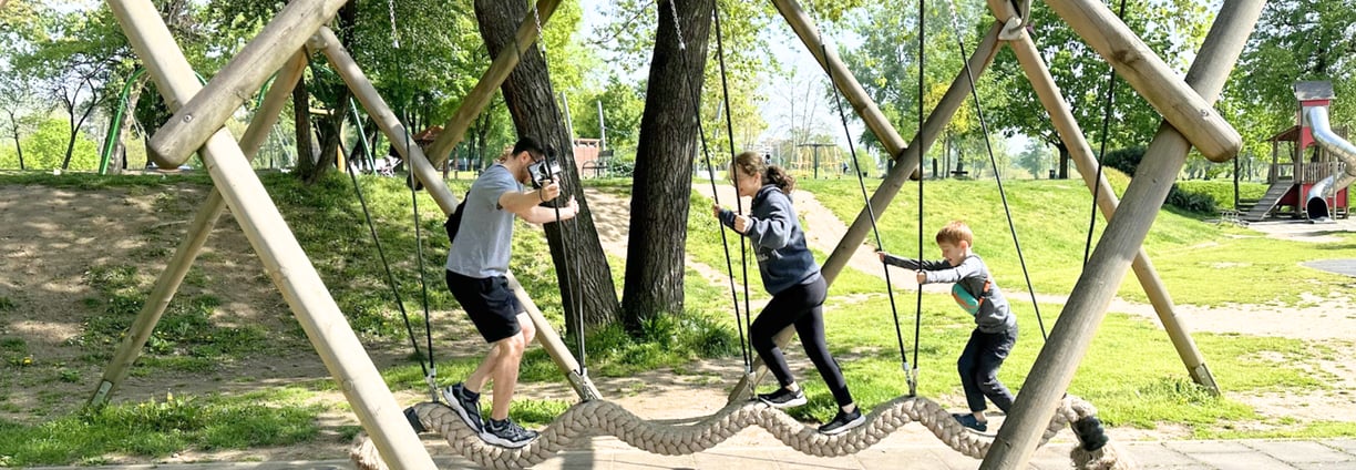 family playing at park