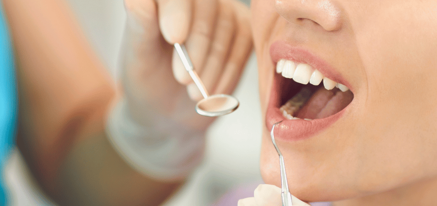 An experienced dentist in Greater Noida performing professional dental care, ensuring healthy teeth