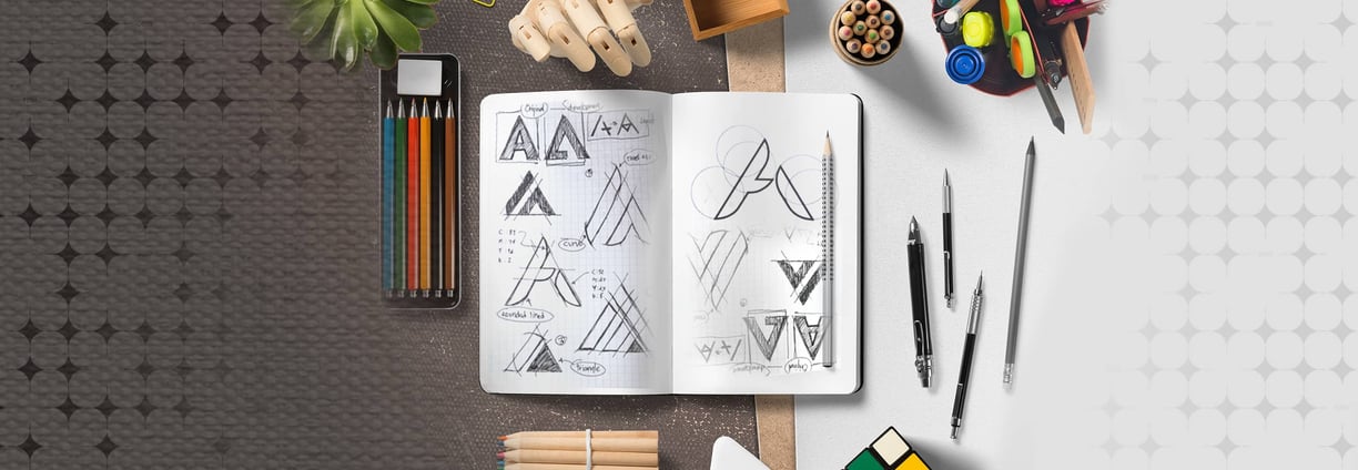 Creative logo sketches and design tools showcasing Desynco’s innovative design solutions.