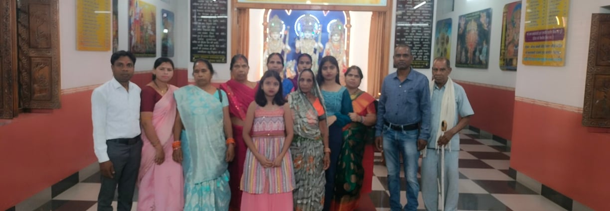 Family group photo in Katghora temple