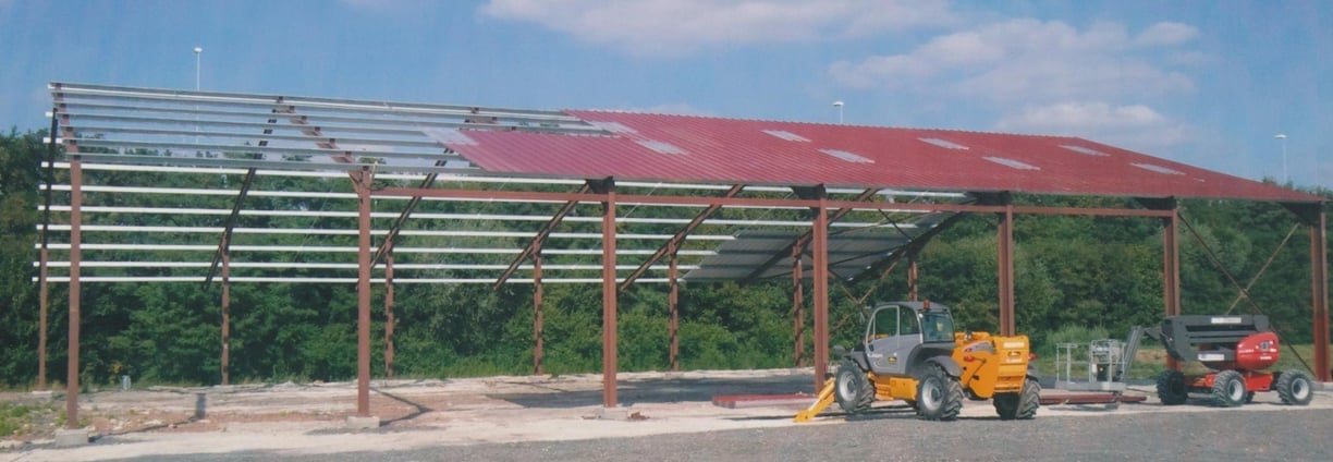 a construction worker is working on a building