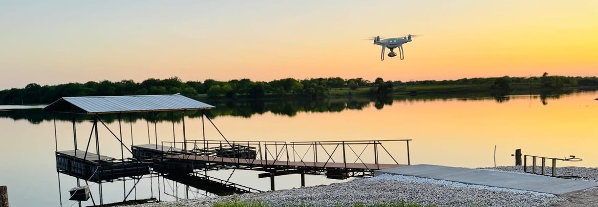 a drone flying over a body of water