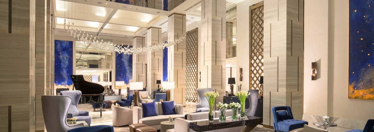 Large-scale mural artwork created by Lumai Studio for grand lobby at St. Regis Astana