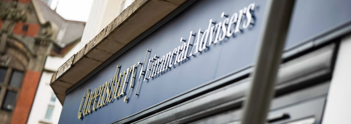 a sign that says 'Queensbury Financial Advisers'