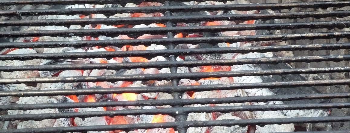 grill with hot coals underneath