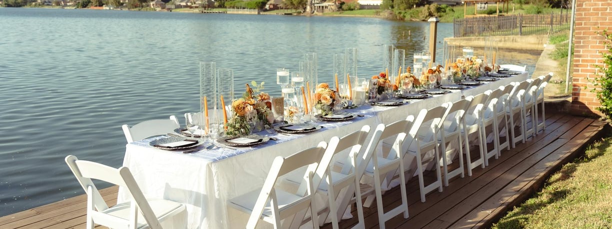 a long table with a long table set up for a dinner