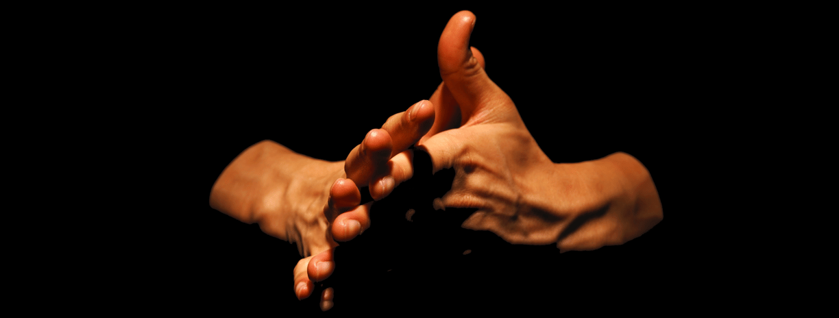 two hands with precise contours and reliefs rub against each other