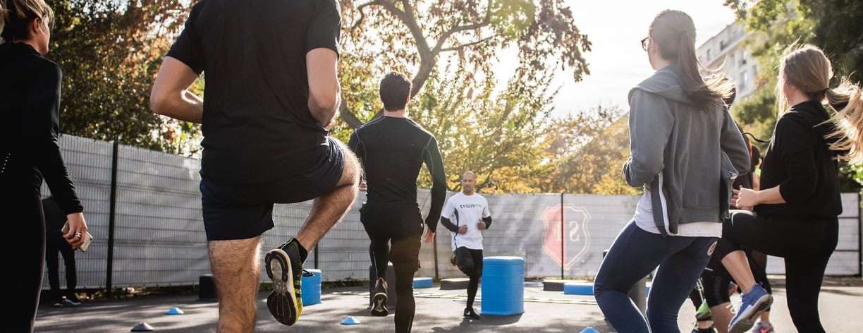 Colleagues working out together and practicing sports