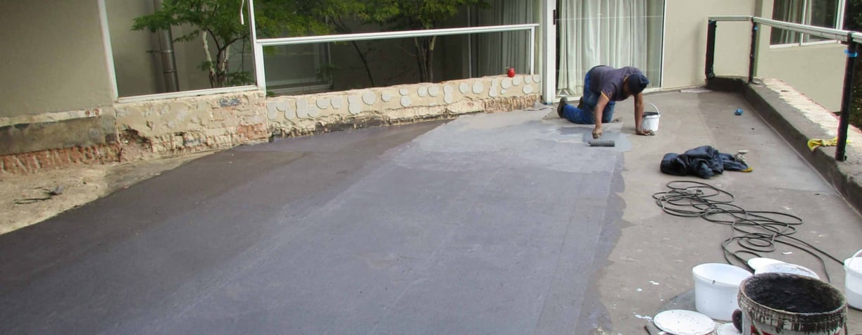 Precision waterproofing membrane application to for a perfect seal for balcony slab, Fourways Gardens, Sandton