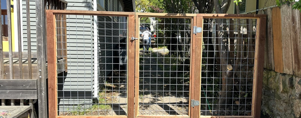 a fenced in area with a fenced in area with a fenced in