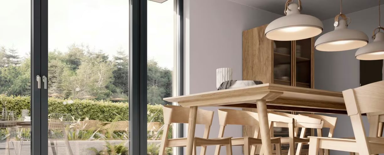 a dining room with a table and chairs