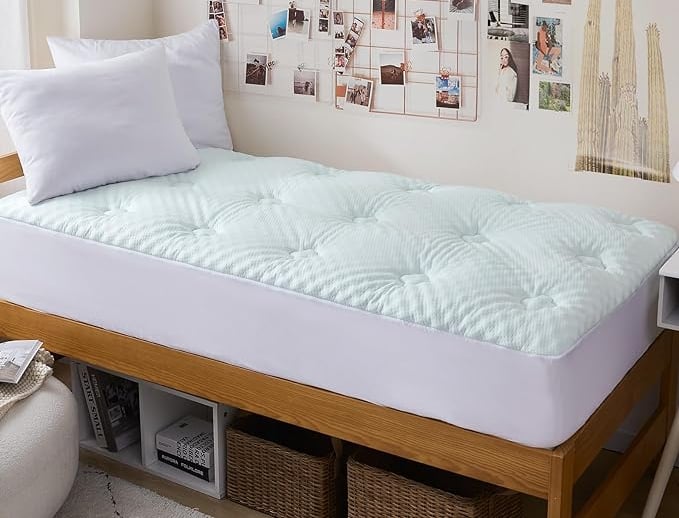 a bed with a bed and a desk with a chair