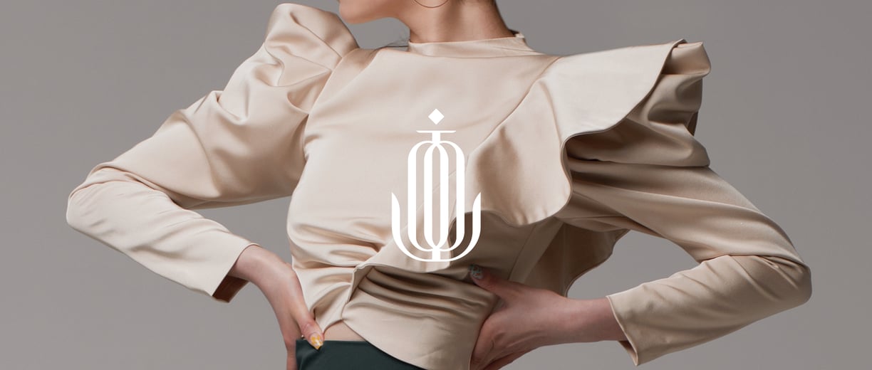 toto braz textile symbol applied to a stylish image with a woman wearing stylish, beige clothes