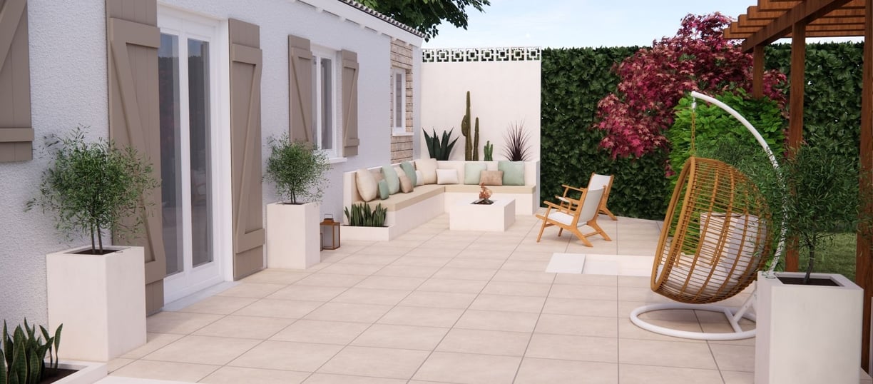 Aménagement et décoration d'une terrasse sur plot avec canapé d'angle jardinière en béton cellulaire
