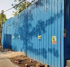 a blue fenced in area with a blue fence