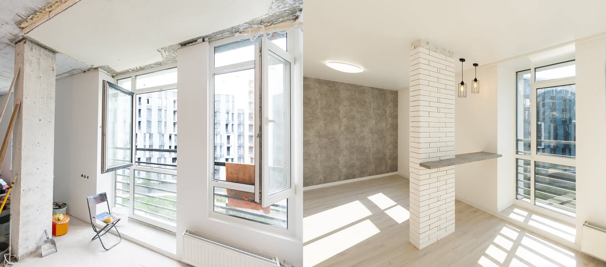 a room with a large window and a chair