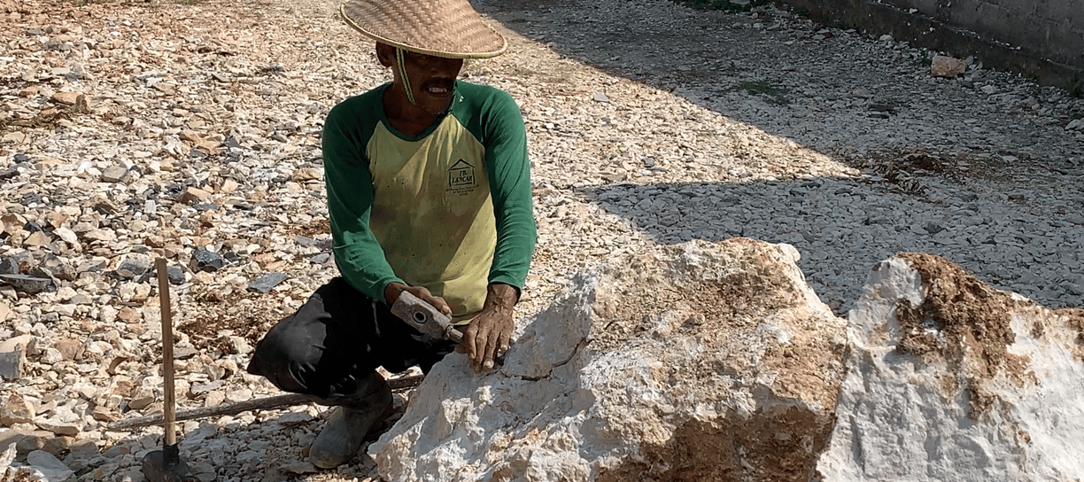 Workers are taking pieces of stone to make mosaics