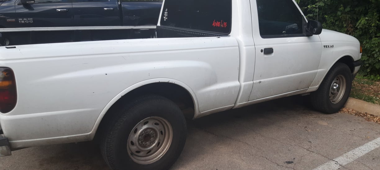 Junked white truck