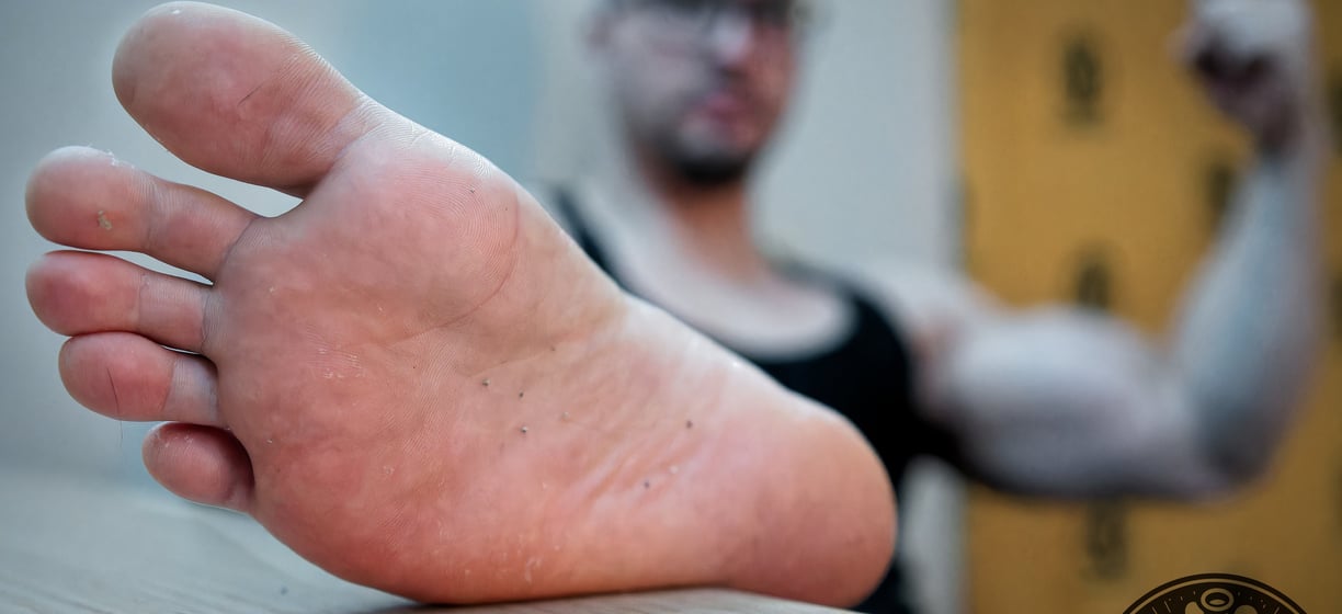 a man with his feet on a table