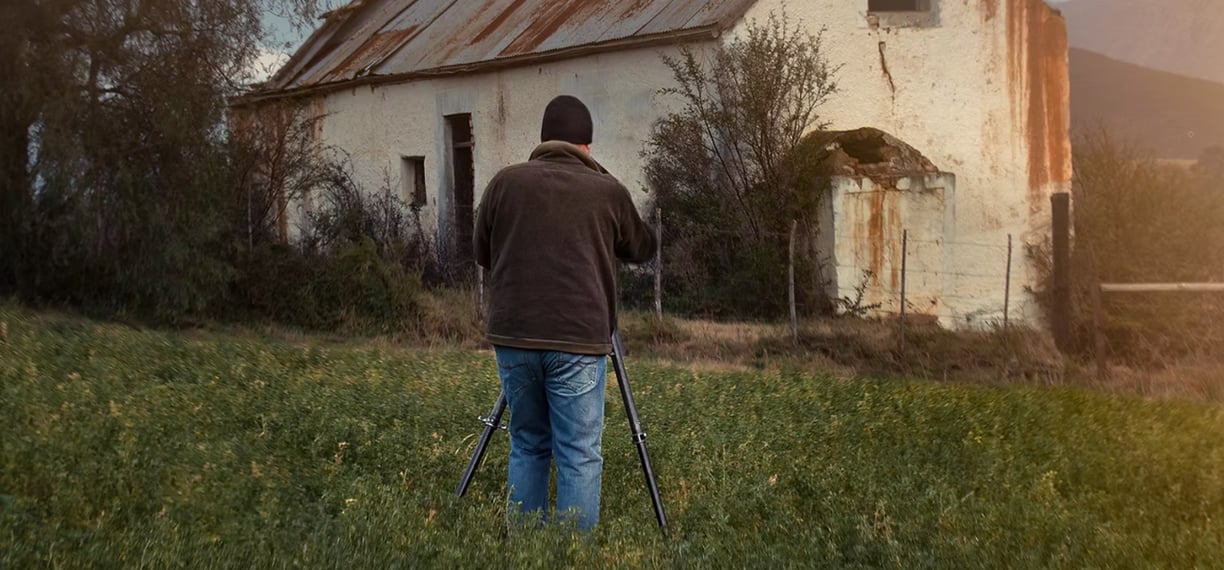 Martin Osner capturing an old abandoned building on location during the creation of his fine art Abandoned Places Photography