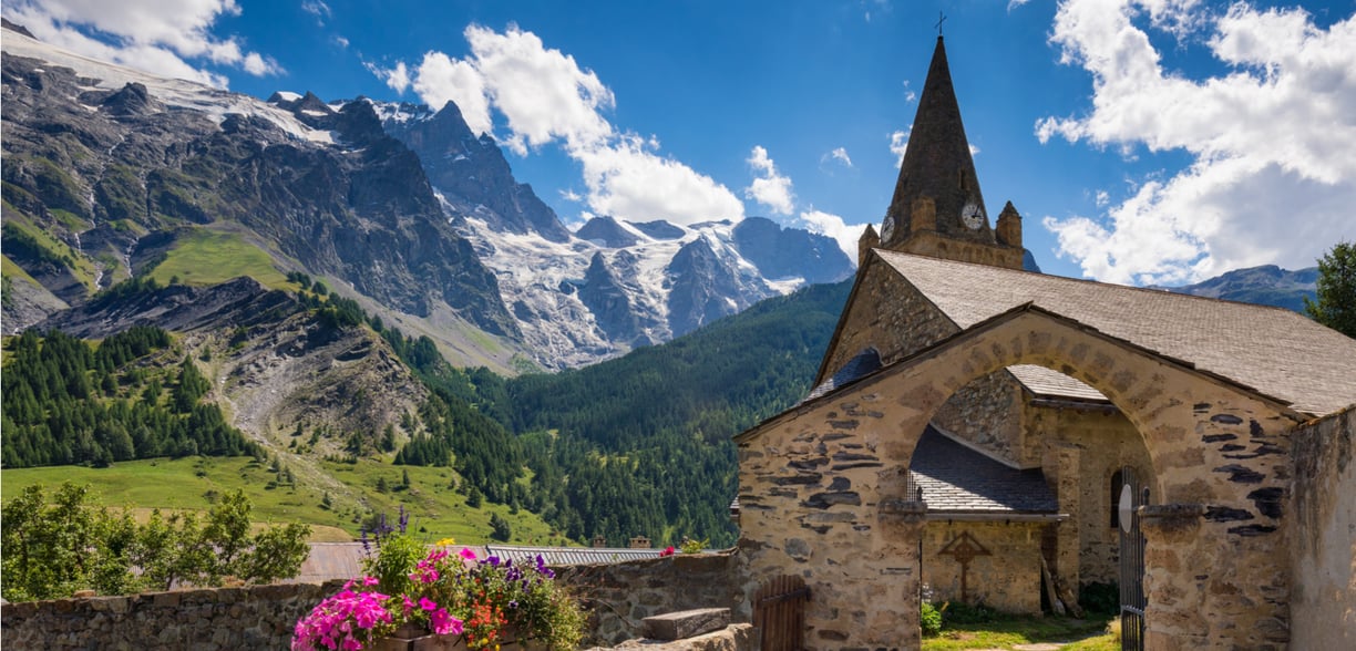 Alps France village church mountains snow blue sky