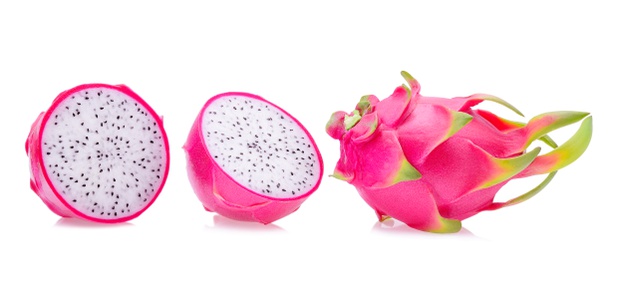 3 hot pink dragon fruits. 1 cut in half showing a white center speckled with tiny black seeds