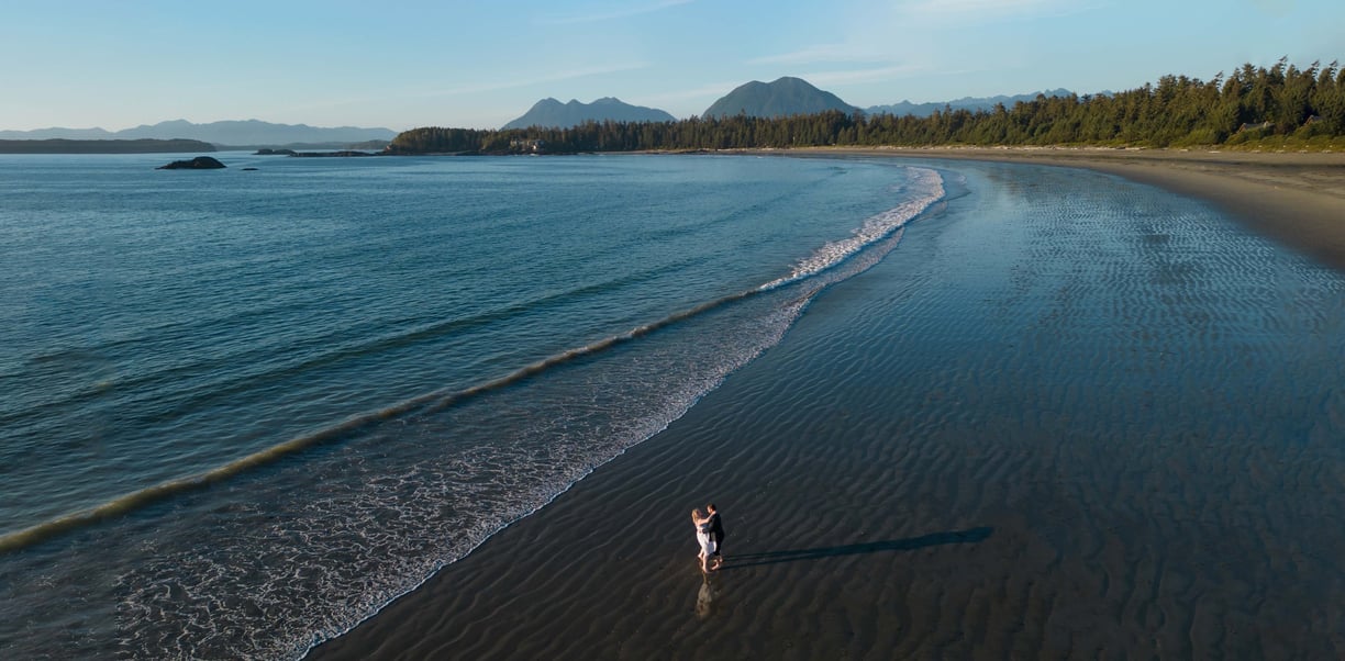 Tofino elopement photographer photographing a couple eloping on Chesterman beach