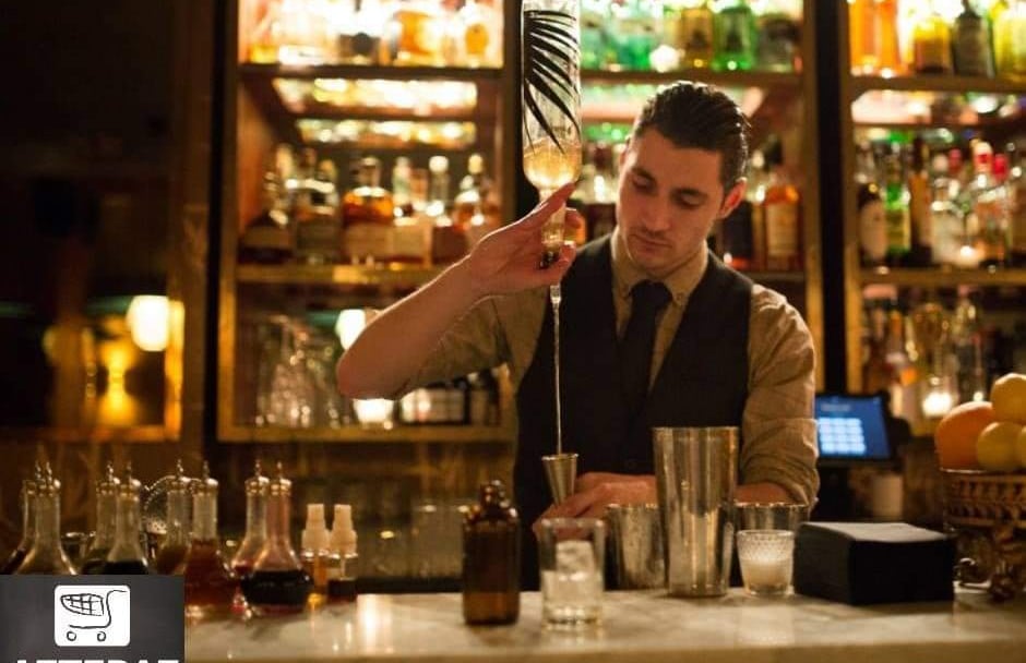 A bartender serving a drink