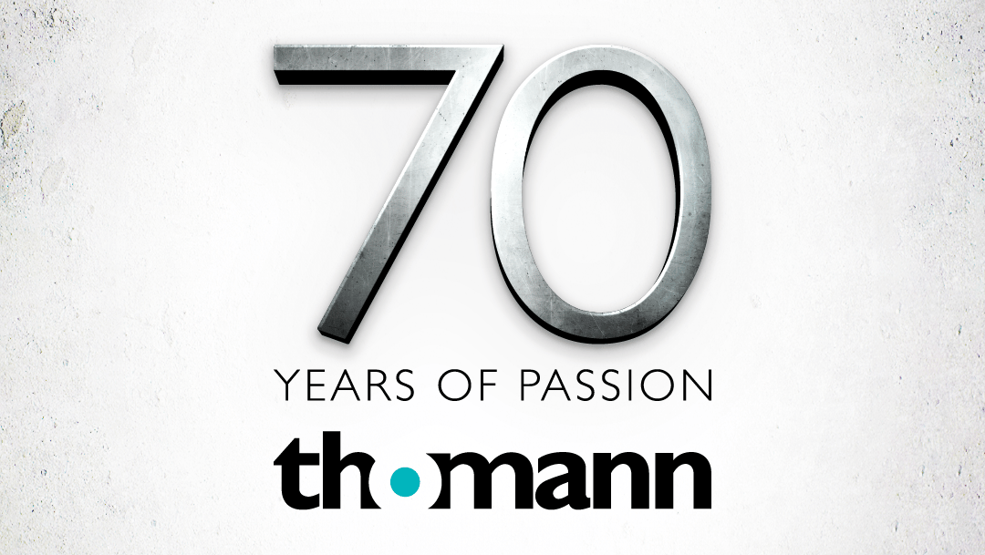 a logo of thomann 70 years of passion